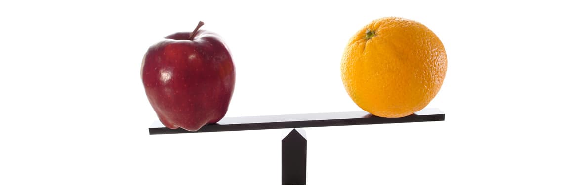 Metaphor comparing apples to oranges balanced on beam